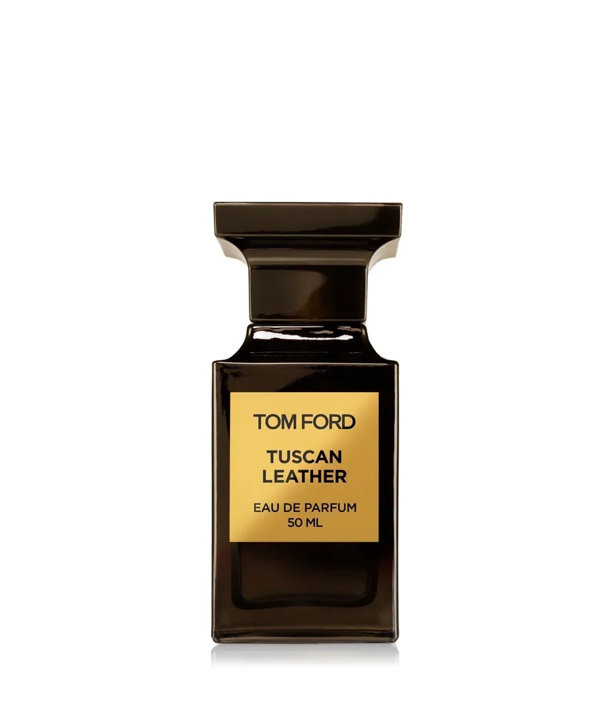 Image of a bottle of Tom Ford Tuscan Leather eau de parfum. The bottle is brown with a gold label.