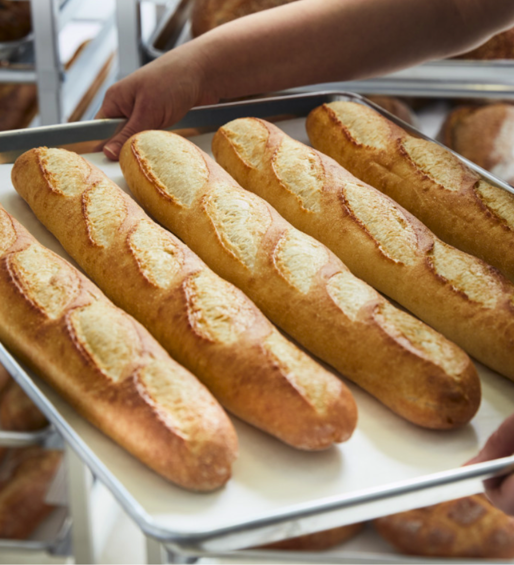Baguettes on a baking pan