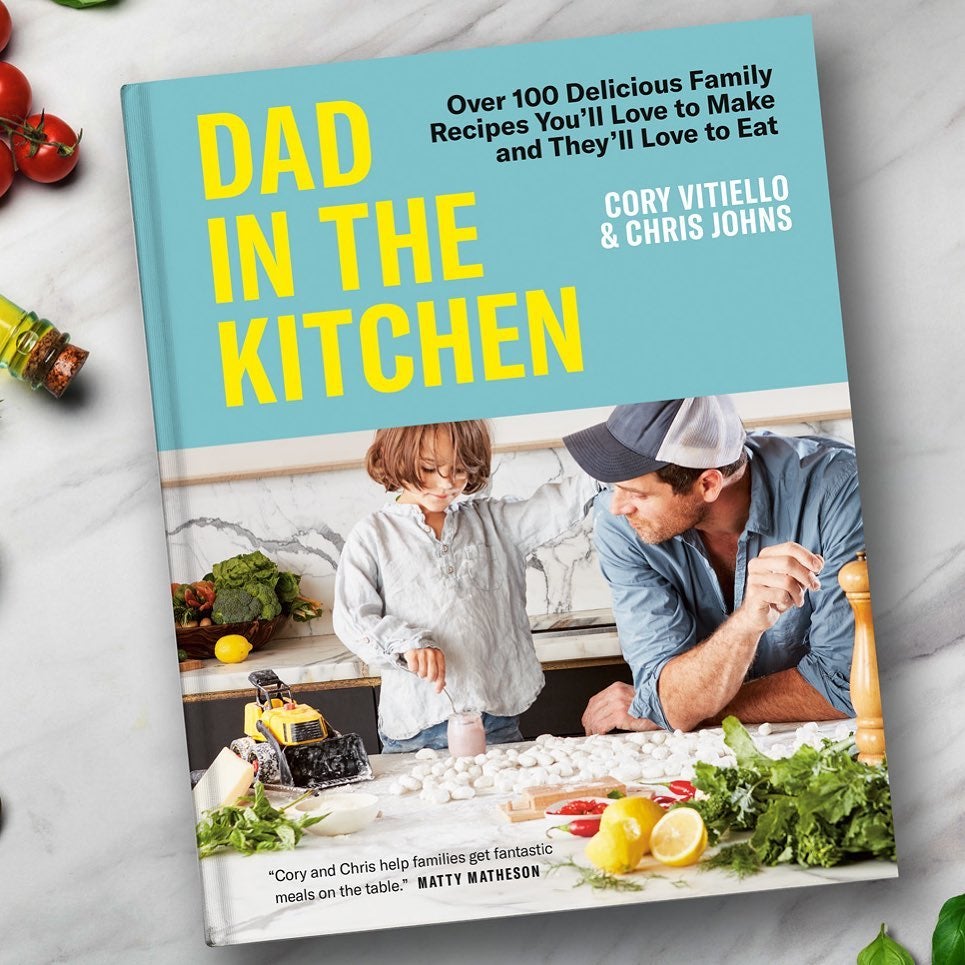 A close up image of the cookbook "Dad in the Kitchen" by Cory Vitiello and Chris Johns.