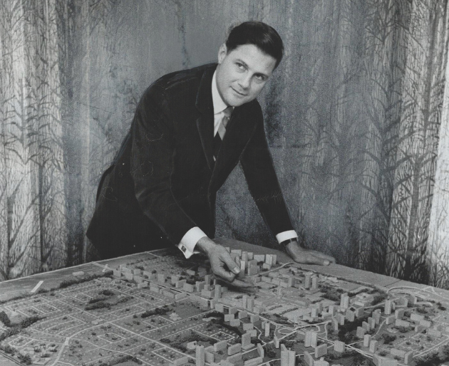 Picture of man with a architectural model