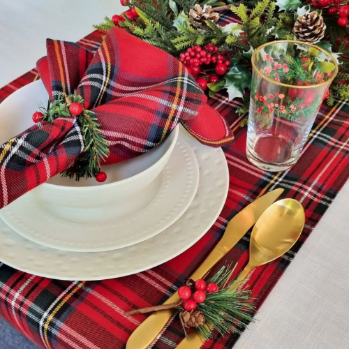 Red plaid Christmas-themed table decor and dinnerware set