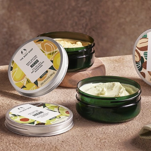 A group of jars of body cream