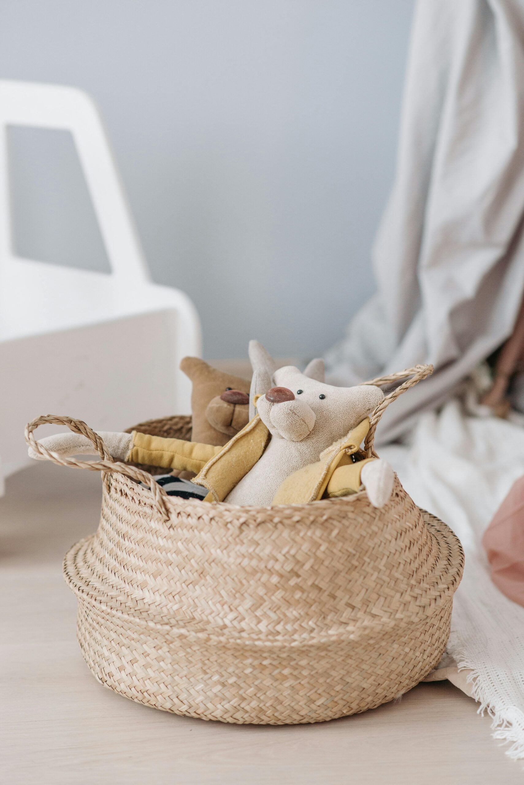 Storage basket with stuffed toys