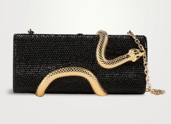 A black textured handbag with a gold snake design wrapped around it.