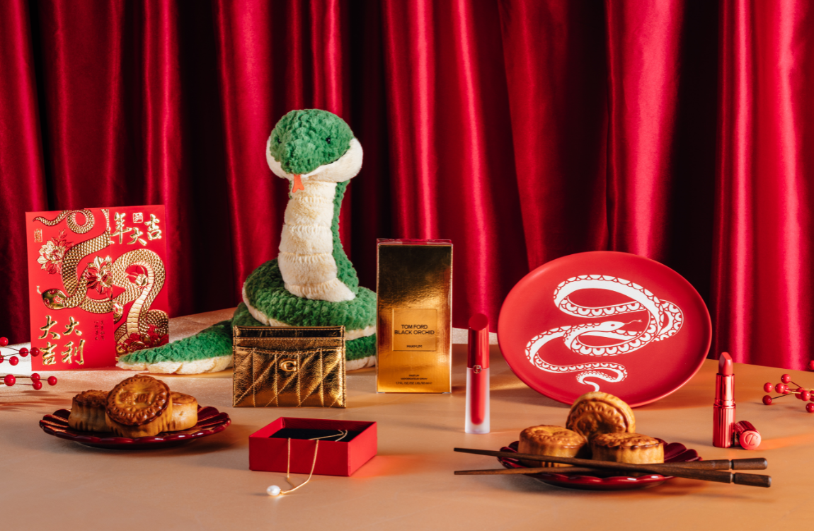 An assortment of Lunar New Year themed gift picks arranged on a table.