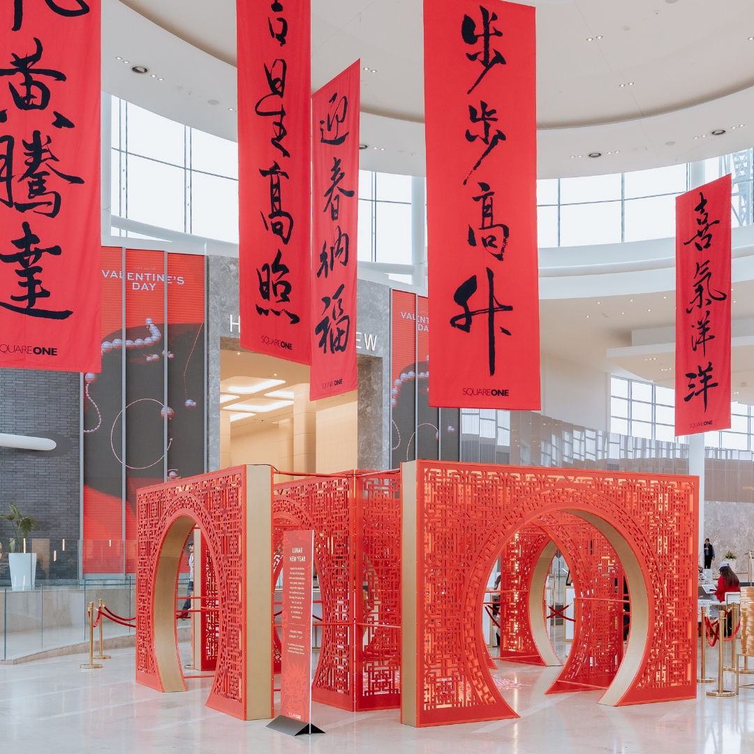 Red arches with red hanging scrolls above them.