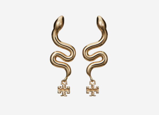 A gold pair of earrings designed to look like a snake.