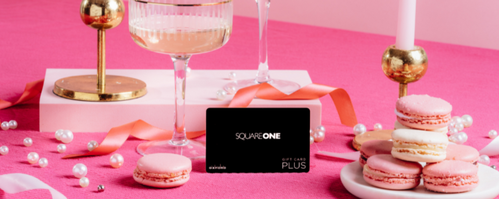 A Square One gift card in the centre of a festive Valentine's Day tablescape.