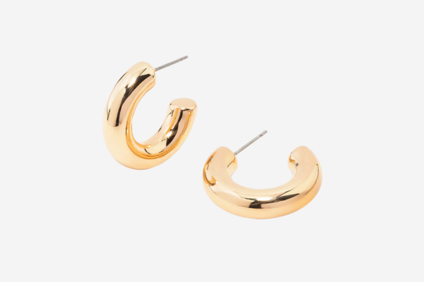 Small gold hoop earrings.