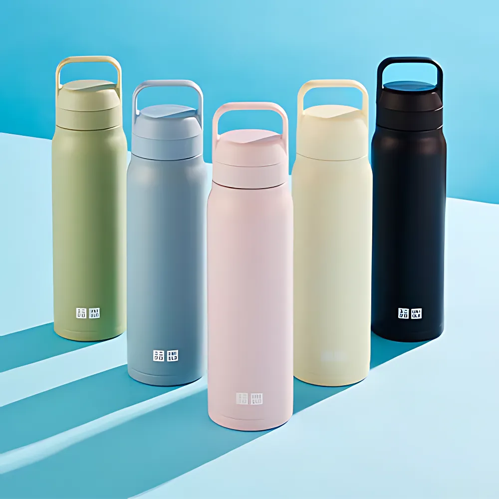 Stainless Steel coloured water bottles that are Uniqlo branded.