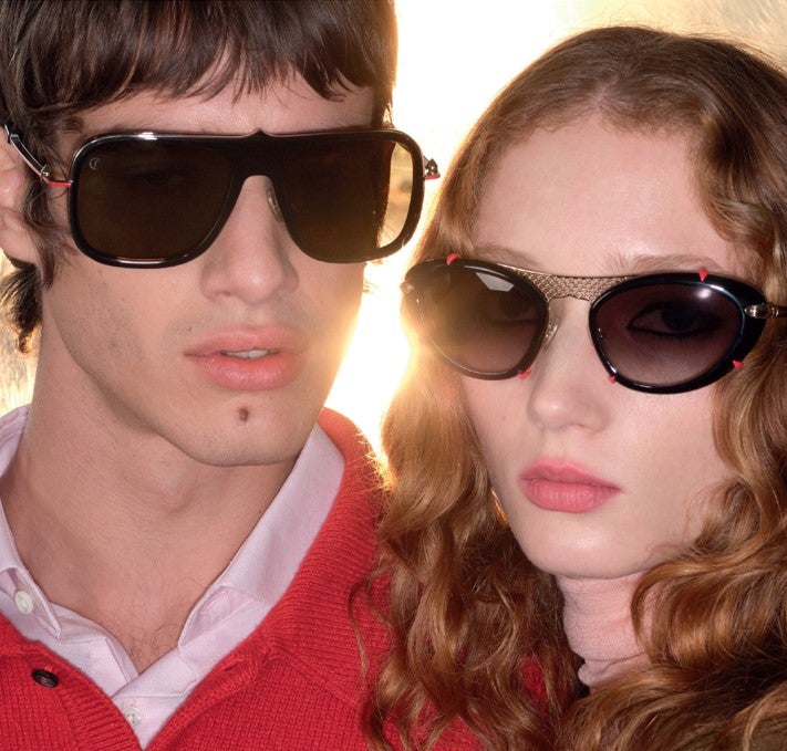Two people wearing eyewear from Christian Louboutin.