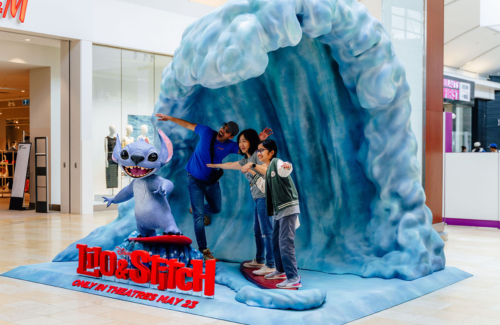 A photo op with a life size model of Stitch surfing from Lilo & Stitch