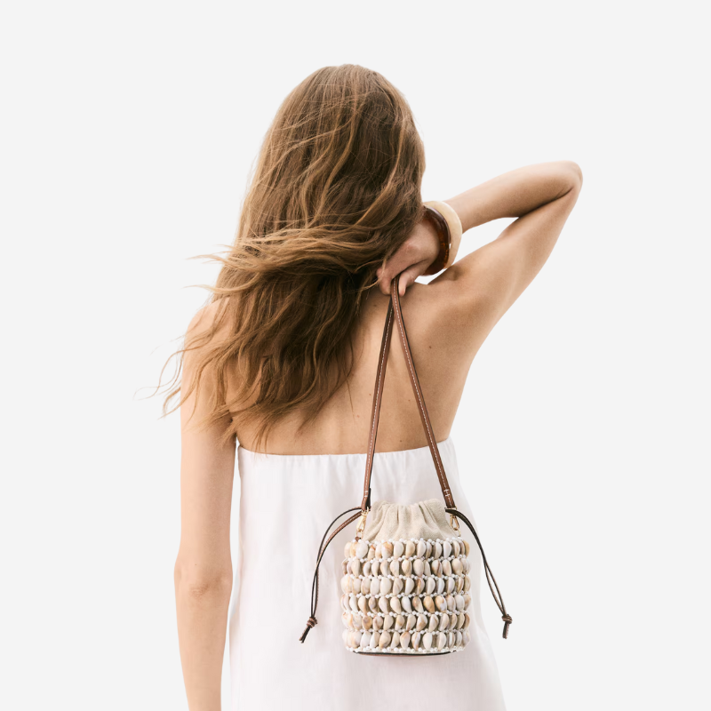 Crossbody bucket bag with shell details