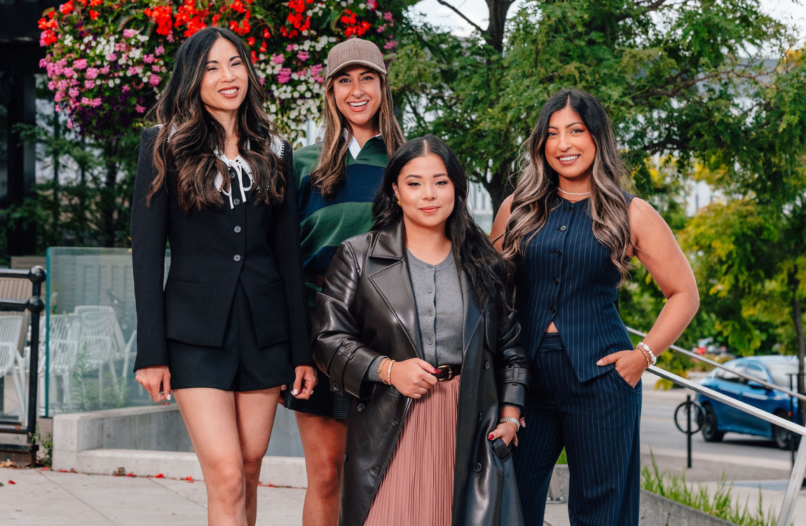 Four women dressed in Fall Fashion.