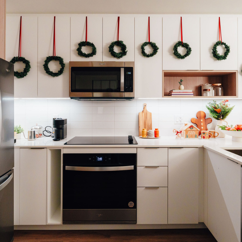 A kitchen decorated with holiday decor.