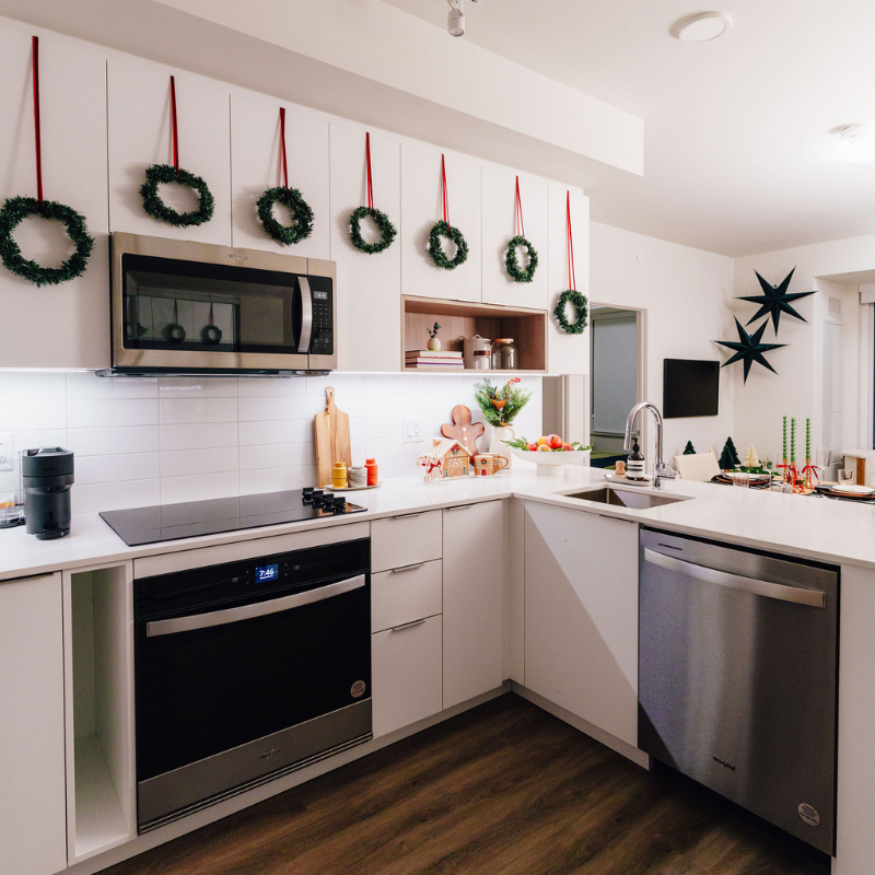 A kitchen decorated with holiday decor.