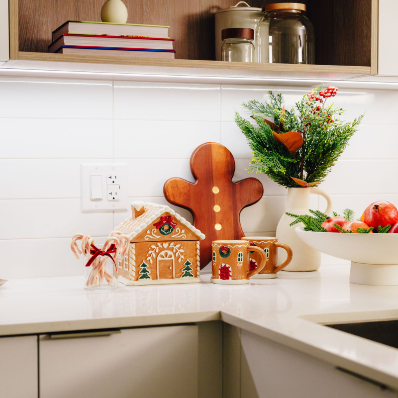 A kitchen counter decorated with holiday decor.