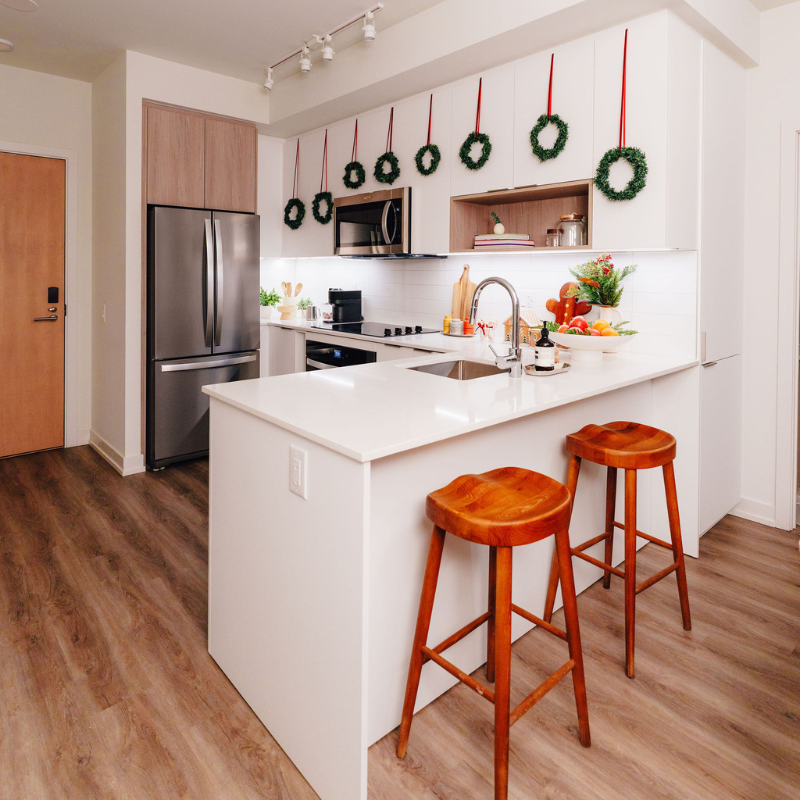 A kitchen decorated with holiday decor.