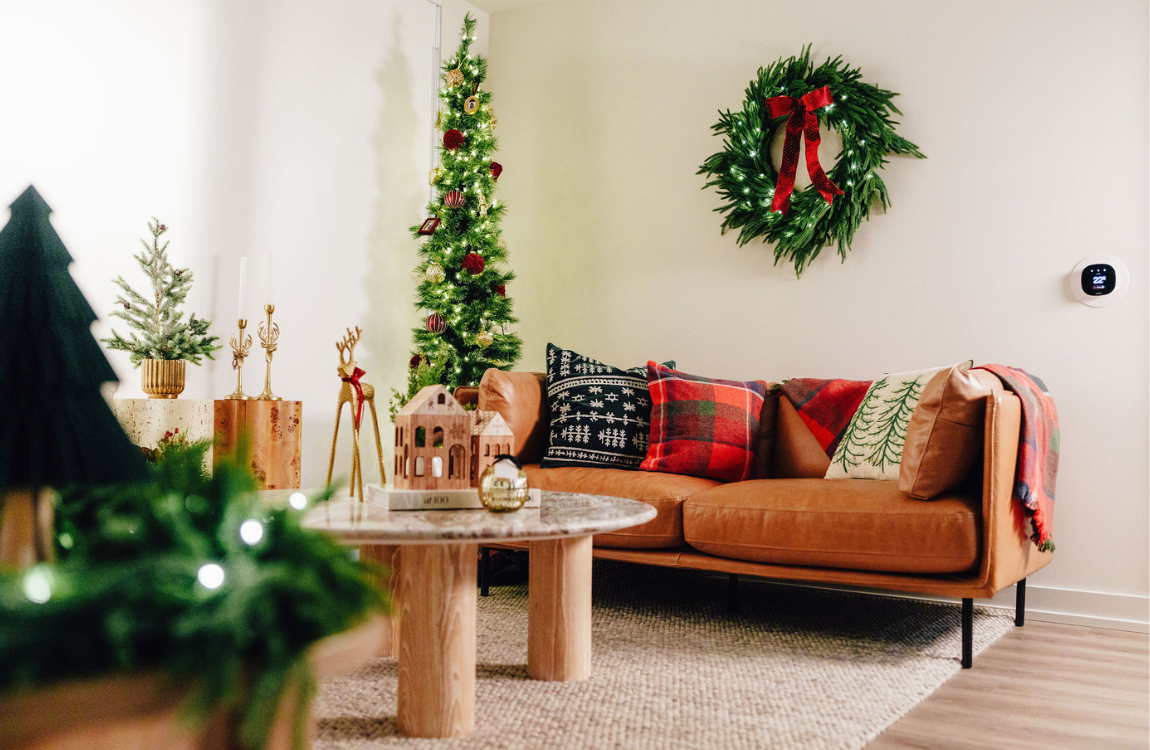 A living room decorated for the holidays.